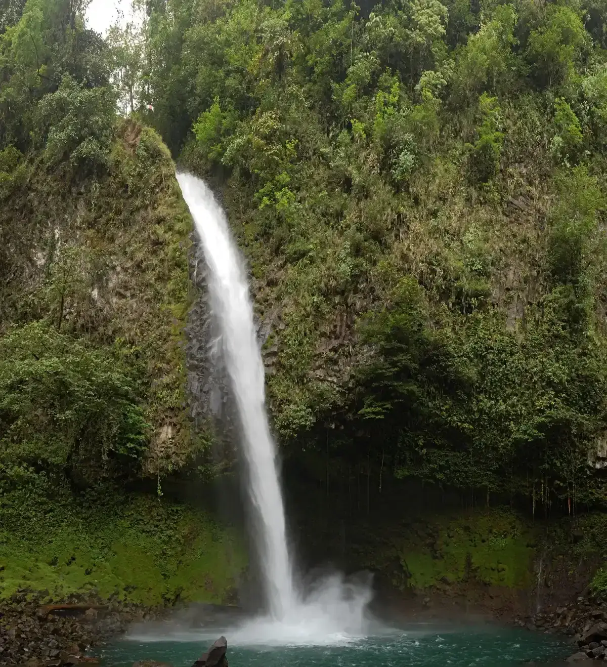 The pool at the base of La Fortuna Waterfall where the day tour swims in Costa Rica